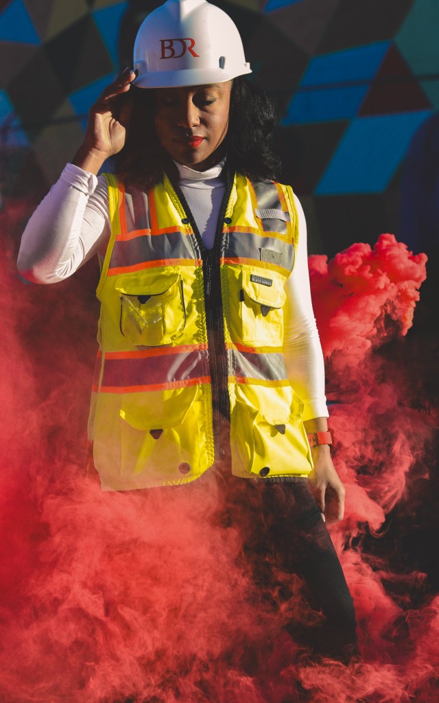 NAWICATLANTA.COM About Us Picture. Kellie with red smoke